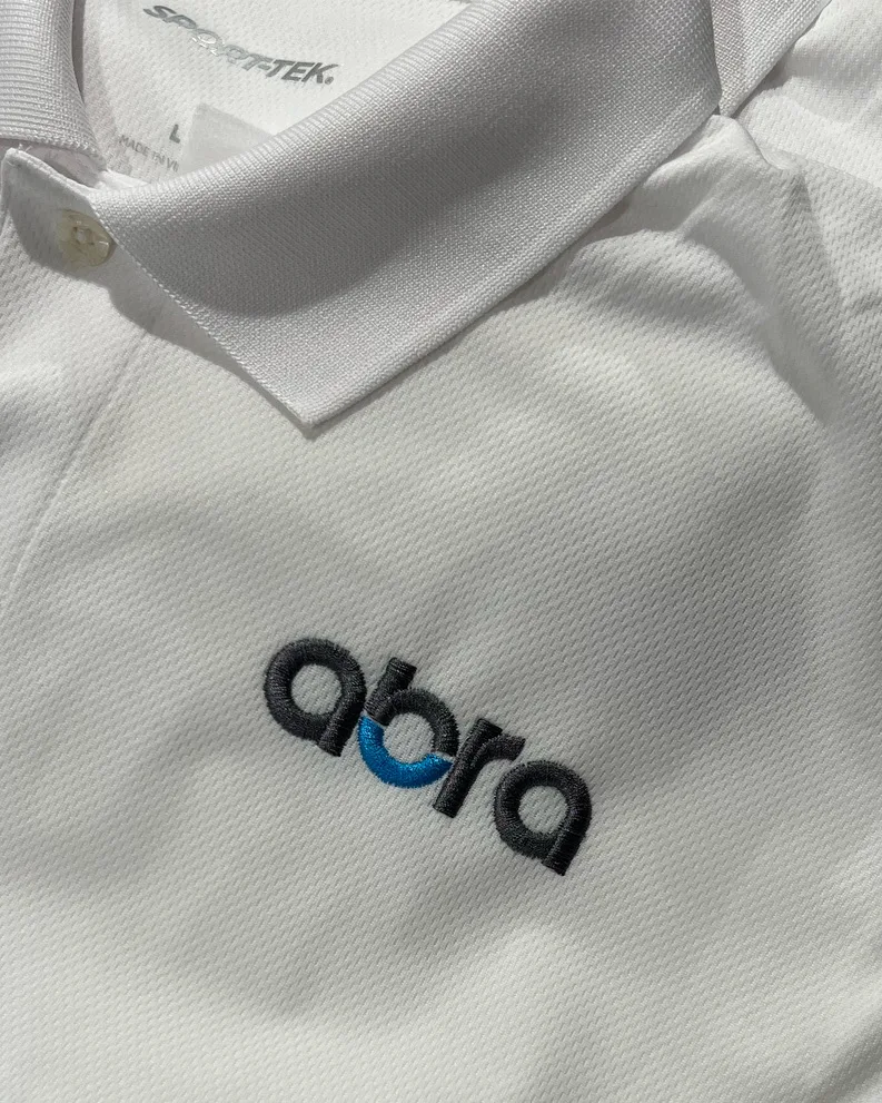 Abra performance polo